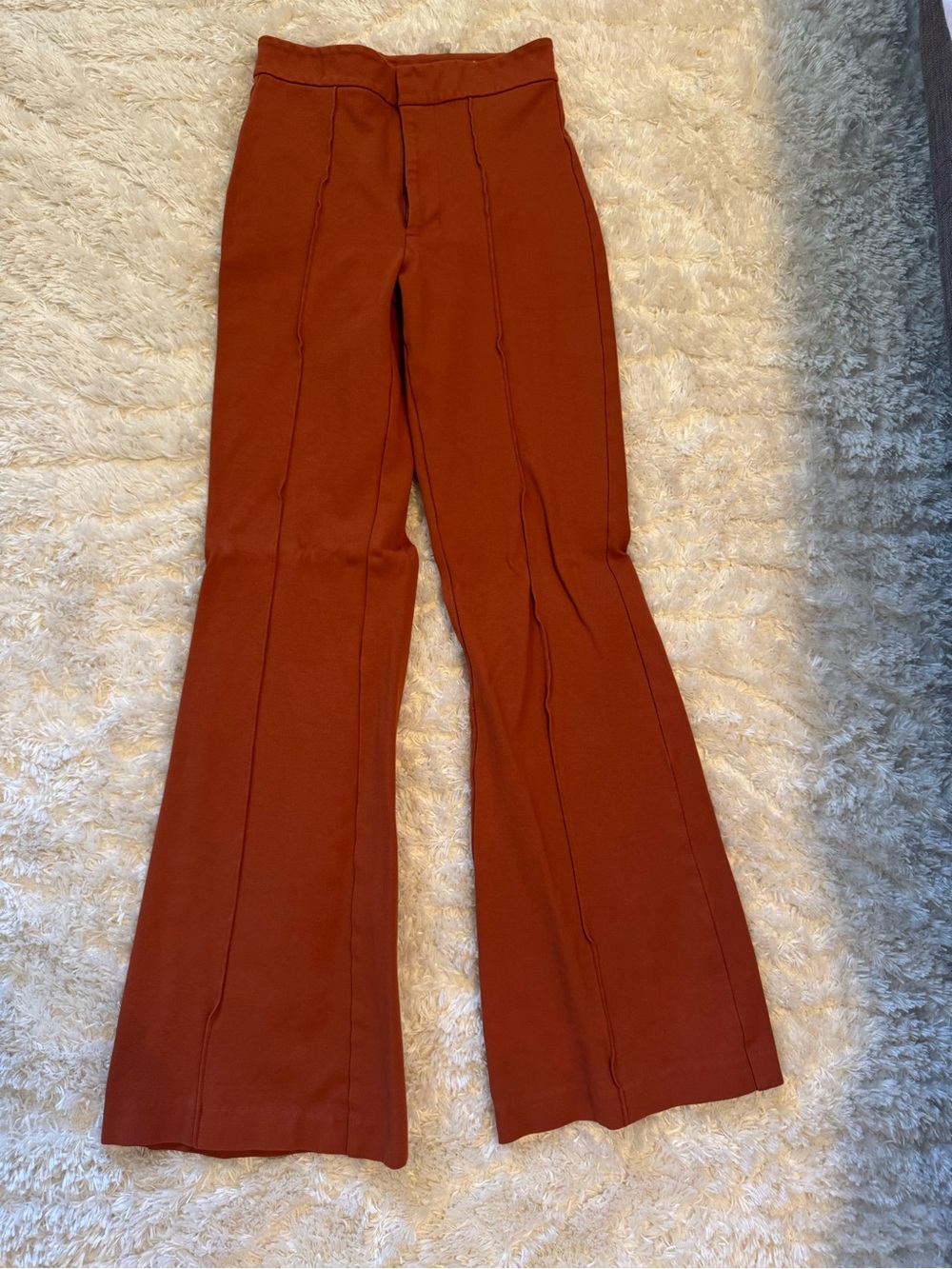 High-Rise Flared Pants in Rust and Black - Picture 2 of 9